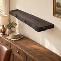 Black Ebony live edge shelf handmade by Rutherford Works above a walnut sideboard